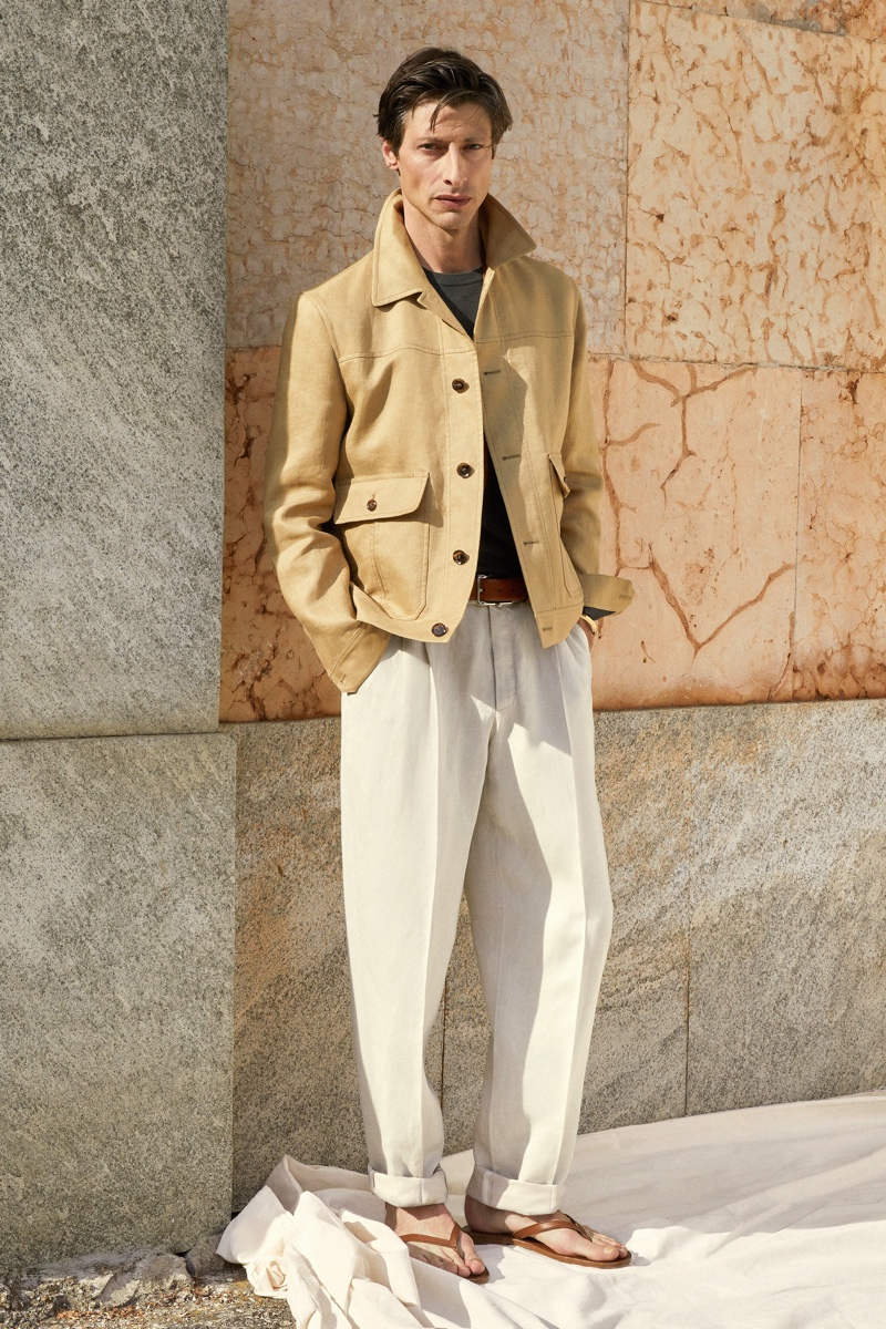 Jonas Mason inspires in chic neutral tones as he models a spring-summer 2022 ensemble from Brioni.