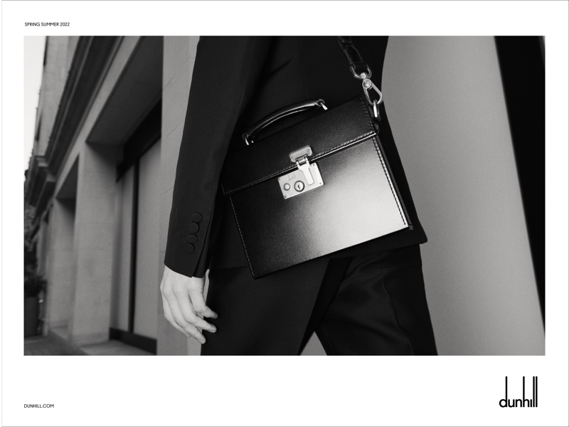 One of Dunhill's signature leather bags steals the scene in an image from the brand's spring-summer 2022 campaign.