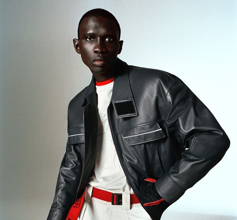 Fernando Cabral wears a leather jacket and other fashionable pieces for Ferrari's spring-summer 2022 men's campaign.