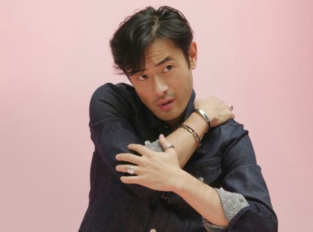 A casual but sleek vision, Yusuke Ogasawara models Tommy Hilfiger denim with Gabriel & Co. jewelry.