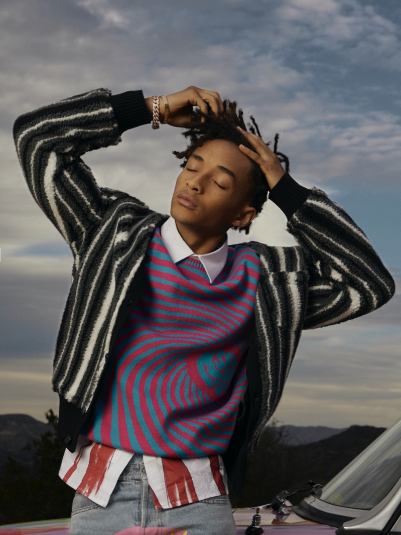 In front and center, Jaden Smith wears a Beams Plus striped cardigan, MSFTSrep sweater, and jeans for Mr Porter.
