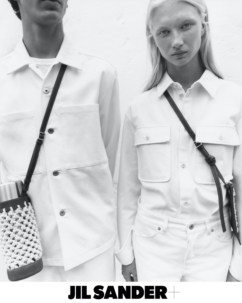 Wearing all white, models Tak Bengana and Evelina Lauren appear in the Jil Sander+ spring-summer 2022 campaign.