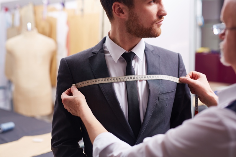 Man Getting Tailored Suit
