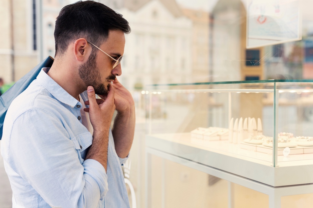 Man Looking at Jewelry