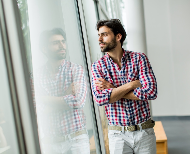 Man Looking at Window Reflection