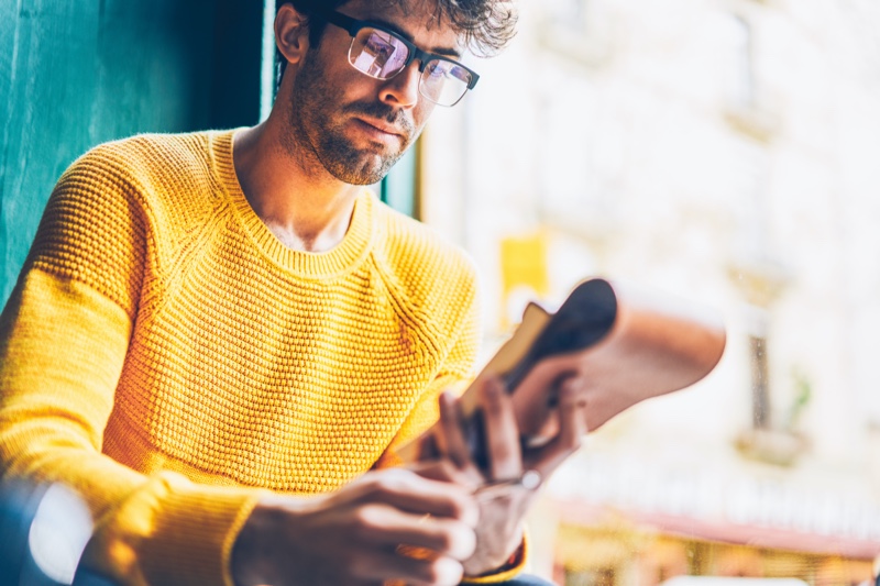 Man in Glasses Yellow Sweater Working