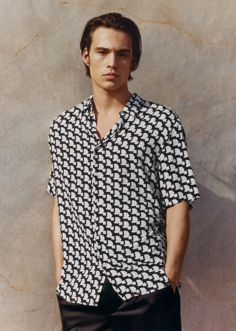 Making a graphic statement, Louis Baines sports a short-sleeve shirt from Mango Man.
