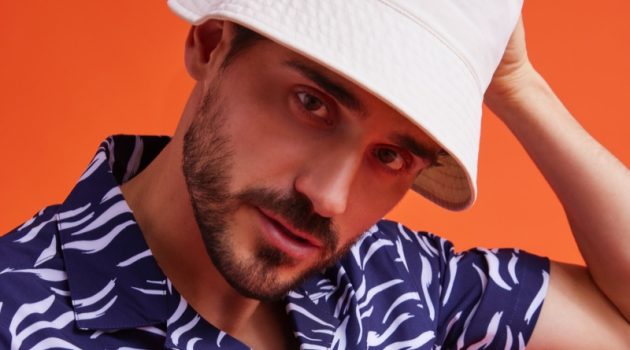 Arthur & Armando Are Beach-ready in New Onia Collection Model Arthur Kulkov embraces a summer vibe in a printed shirt and bucket hat from Onia.