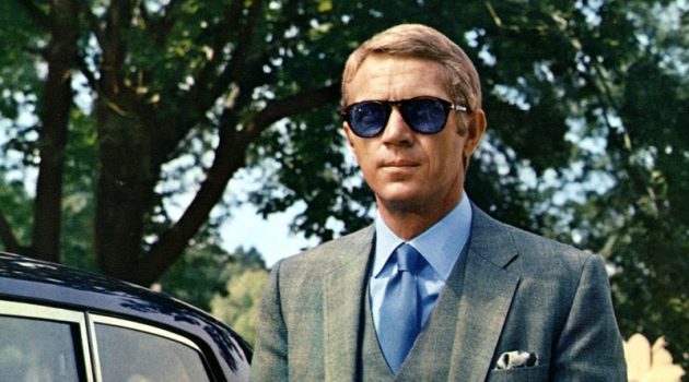 The Most Iconic Suits Seen on the Big Screen Steve McQueen Thomas Crown Affair Plaid Grey Suit