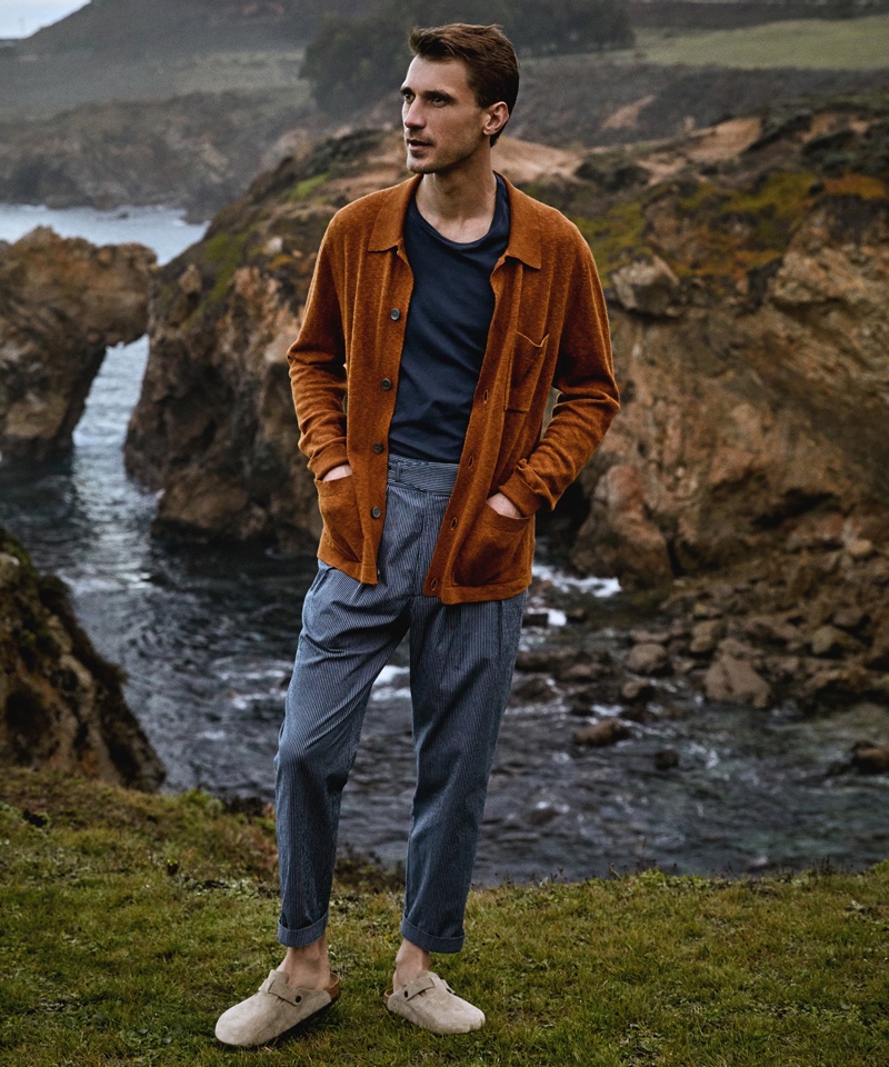 Clément Chabernaud dons a Todd Snyder cotton-linen Pub jacket in dark orange with a Made in L.A. pocket t-shirt and pinstripe Italian Gurkha trousers.