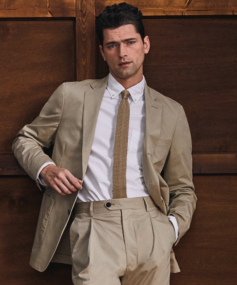 Providing a lesson in modern elegance, Sean O'Pry dons Todd Snyder's Italian cotton twill Madison suit in sand stone.