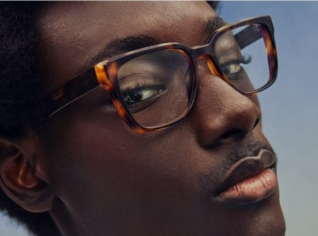 Youssouf Bamba wears Warby Parker's Cumberland glasses in Burnt Umber Tortoise with Marcona Tortoise.