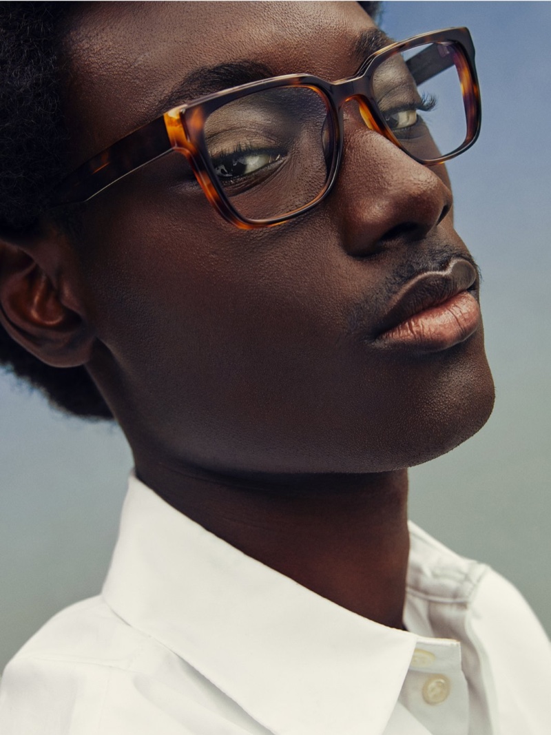 Youssouf Bamba wears Warby Parker's Cumberland glasses in Burnt Umber Tortoise with Marcona Tortoise. » Make an Eyewear Statement in Warby Parker Sculpted Series Youssouf Bamba wears Warby Parker's Cumberland glasses in Burnt Umber Tortoise with Marcona Tortoise.