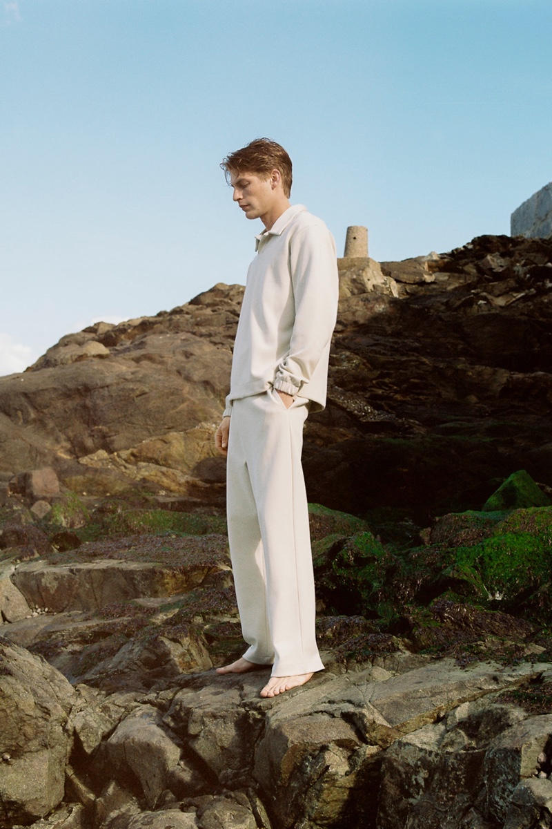 French model Baptiste Radufe wears light-colored day wear for men from Zara.