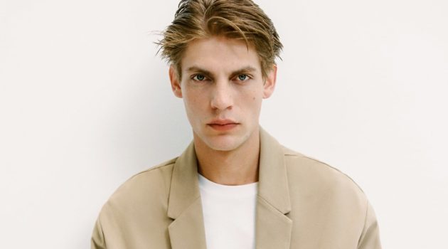 Relaxed tailoring is front and center as Baptiste Radufe wears a tan suit from Zara Man.