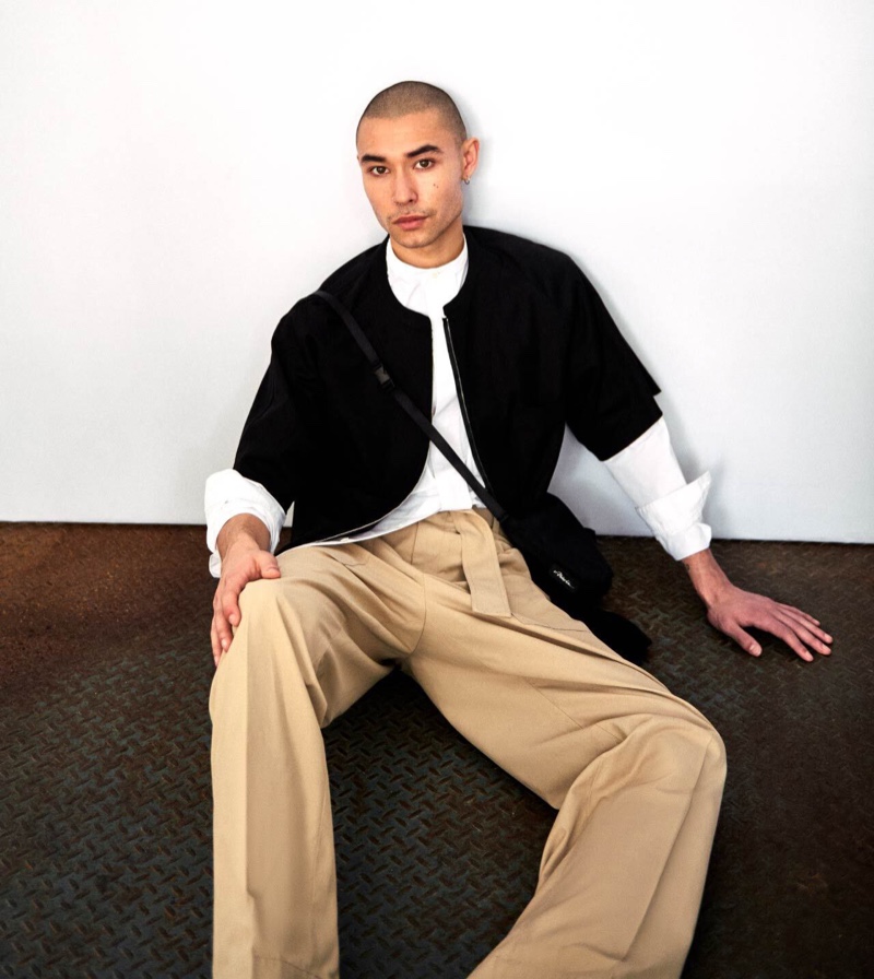 Making a chic fashion statement, Curraun Corriveau wears a short-sleeve zip-front baseball shirt with a band collar shirt for 3.1 Phillip Lim's Kit 3 campaign.