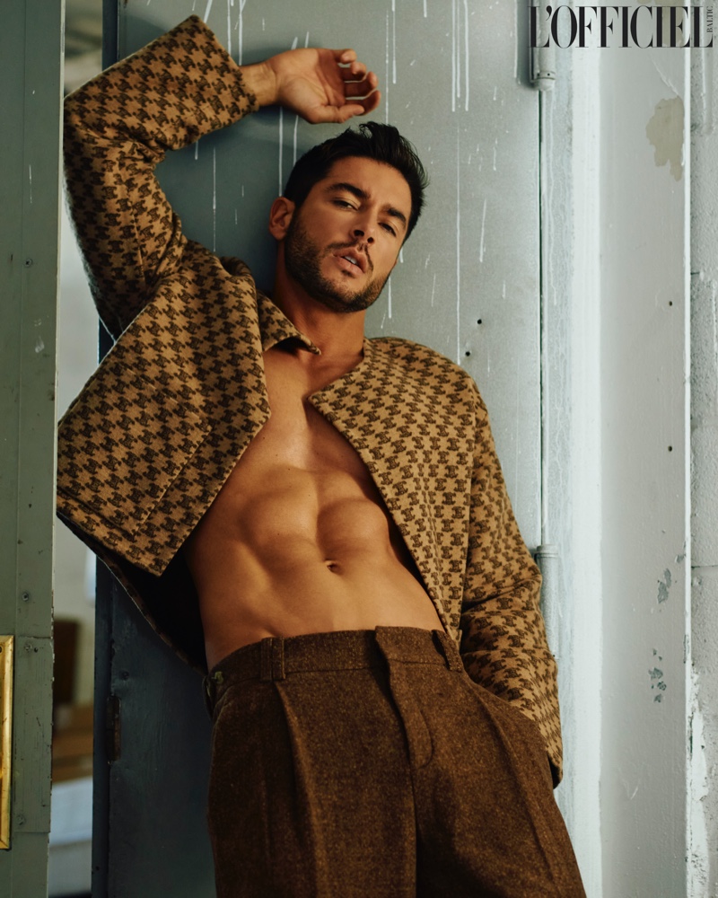 Model Andrea Denver wears a Celine jacket with Vince pants.