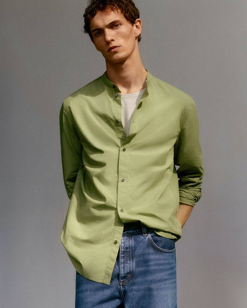 Hitting the studio, Luc Defont-Saviard dons a COS grandad collar shirt with regular-fit jeans.