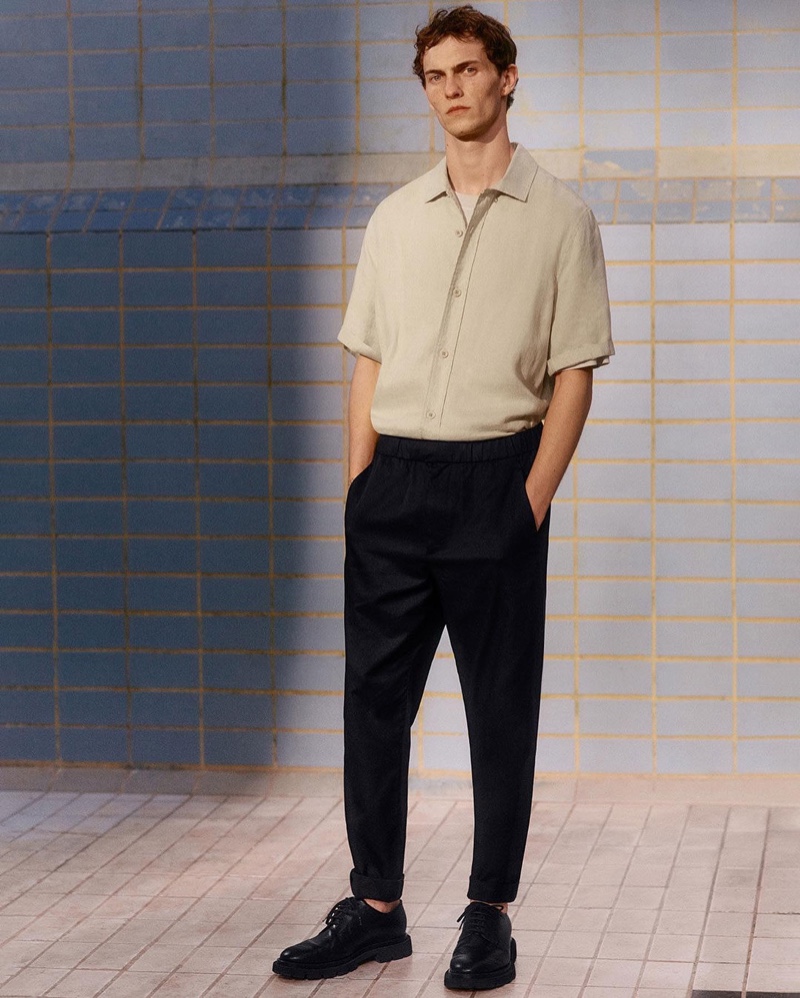 Luc Defont-Saviard dons a minimal spring look from COS.