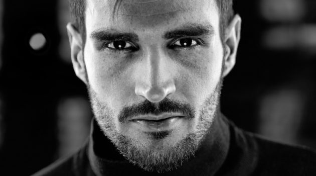 What's The Difference Between Multifocal & Bifocal Contact Lenses? Closeup Man Black White Eyes Photo