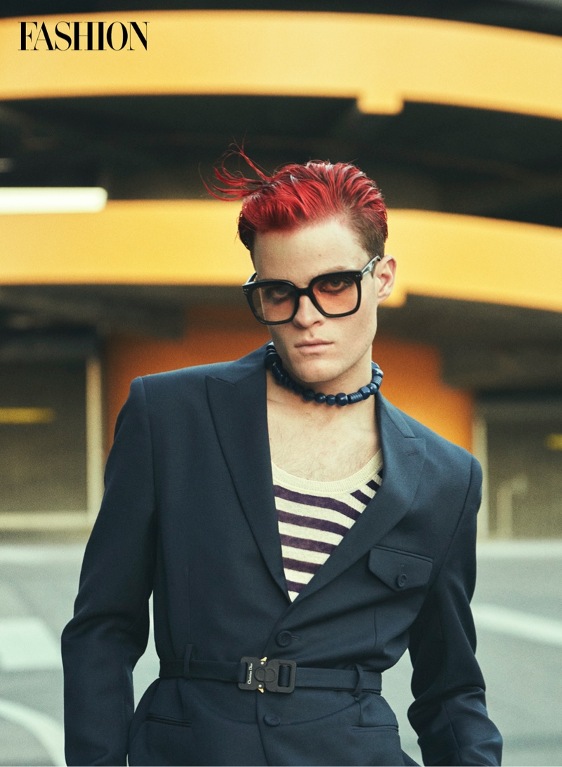 Connecting with Fashion magazine, Jake Wesley Rogers wears a Dior Men blazer with a Saint Laurent top, Gentle Monster sunglasses, and a Lazoschmidl necklace. Photo Credit: Greg Swales