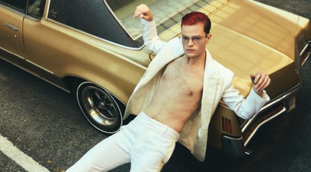 Going shirtless for Fashion magazine, Jake Wesley Rogers wears an Alexander McQueen suit with Saint Laurent shoes and Gentle Monster glasses. Photo Credit: Greg Swales