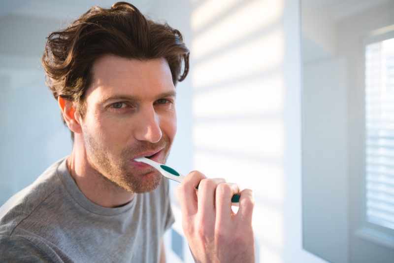 Man Brushing Teeth