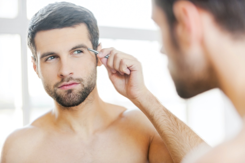 Man Grooming Eyebrows