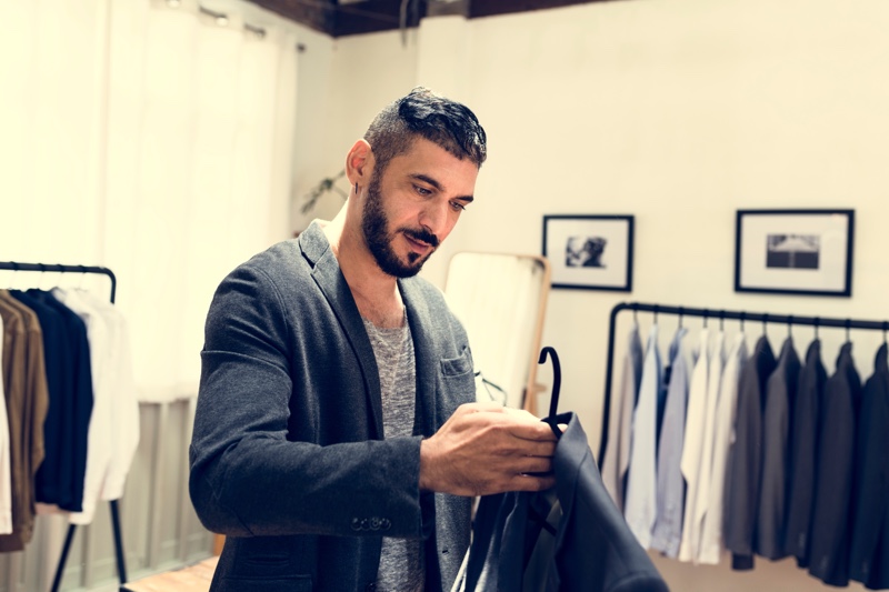 Man Shopping for Quality Clothes Man Shopping for Quality Clothes