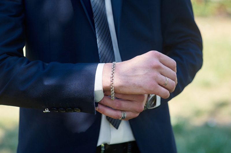 Man Wearing Bracelet Rings Jewelry