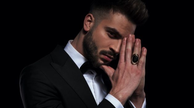 Men's Rings Are Having a Moment Man Wearing Large Ring Tuxedo