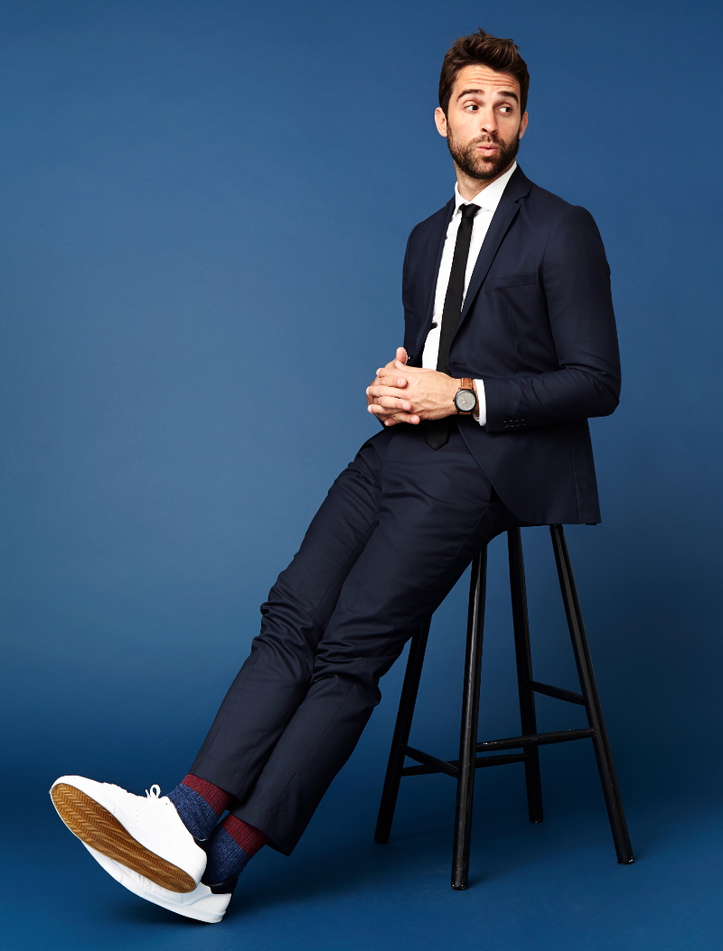 Man in Suit and White Sneakers