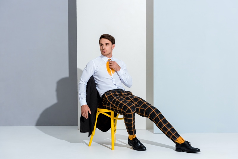 Man in Windowpane Print Trousers Polka Dot Socks