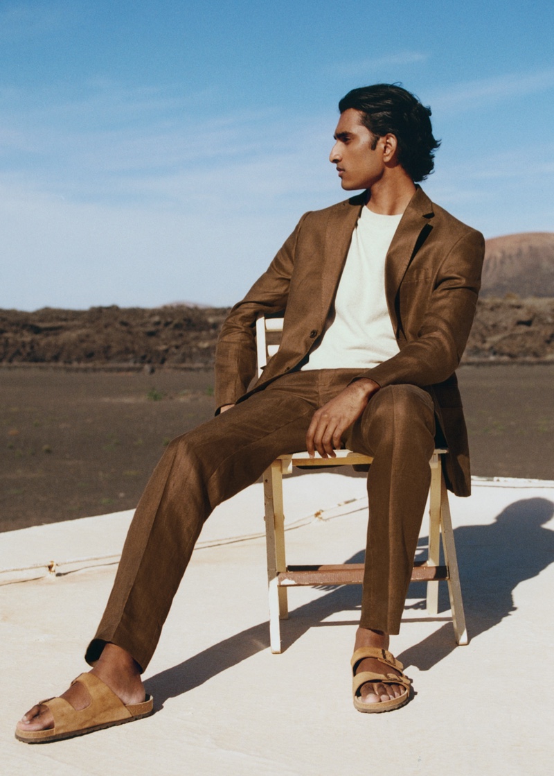 Brown is the color of the season as Jeenu Mahadevan dons a linen suit by Mango Man.
