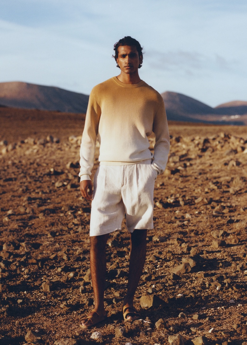 Embracing ombre, Jeenu Mahadevan wears a sweater and pleated linen shorts from Mango Man.