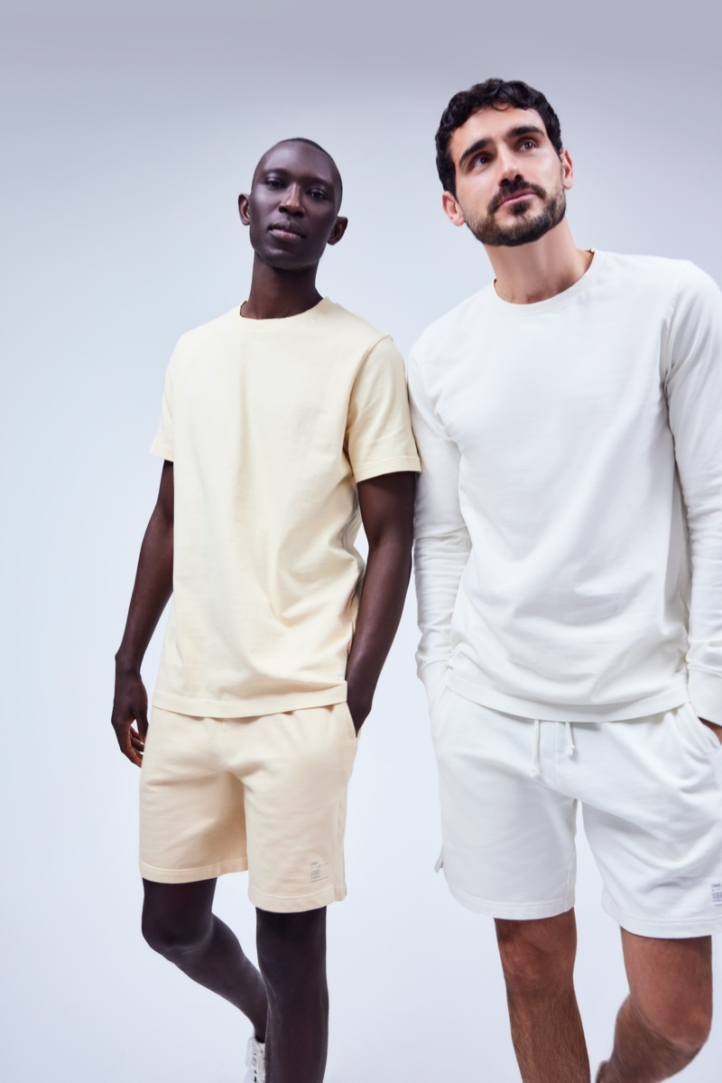 Models Armando Cabral and Arthur Kulkov wear casual wardrobe staples from Onia.