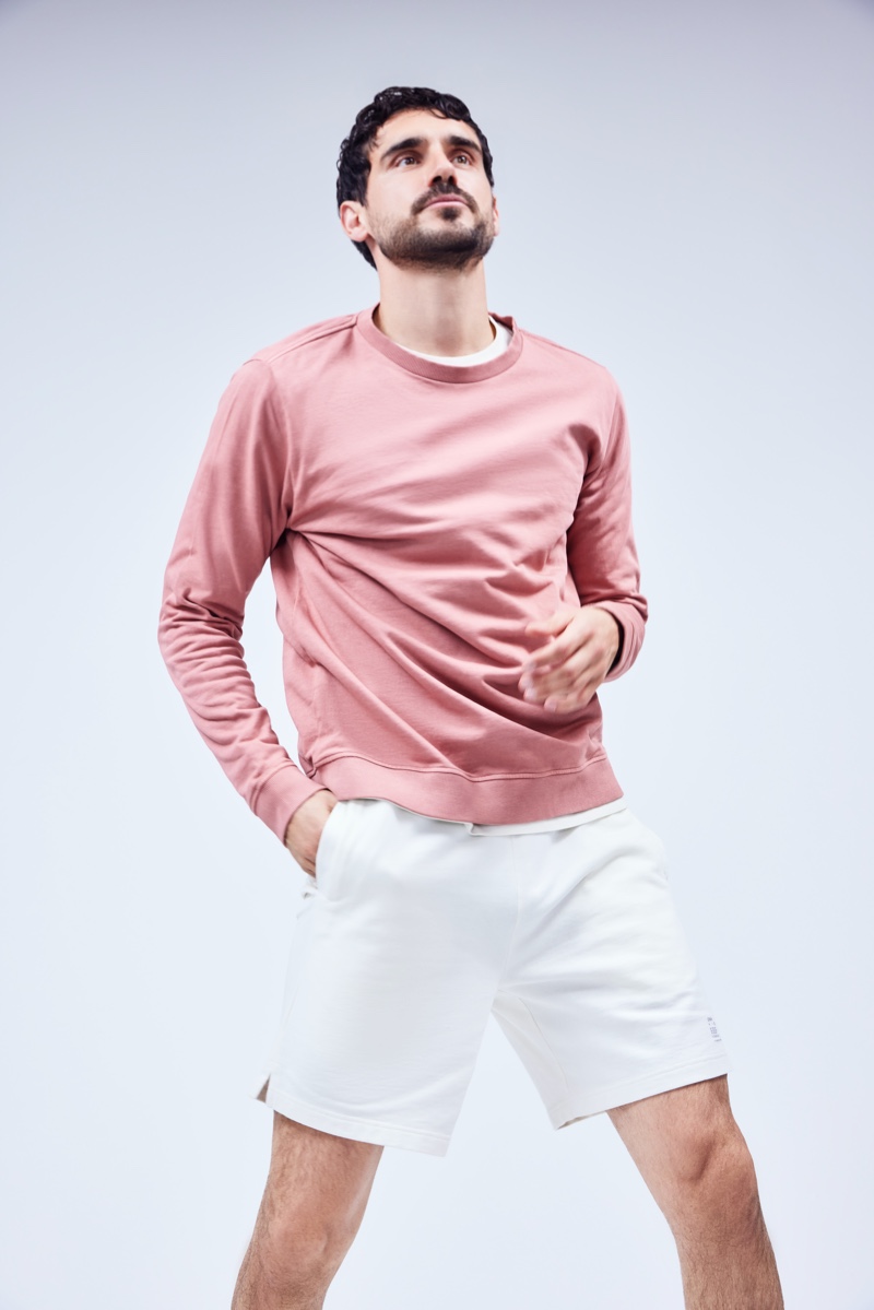 Making a case for leisure style, Arthur Kulkov models a sweatshirt and shorts from Onia.