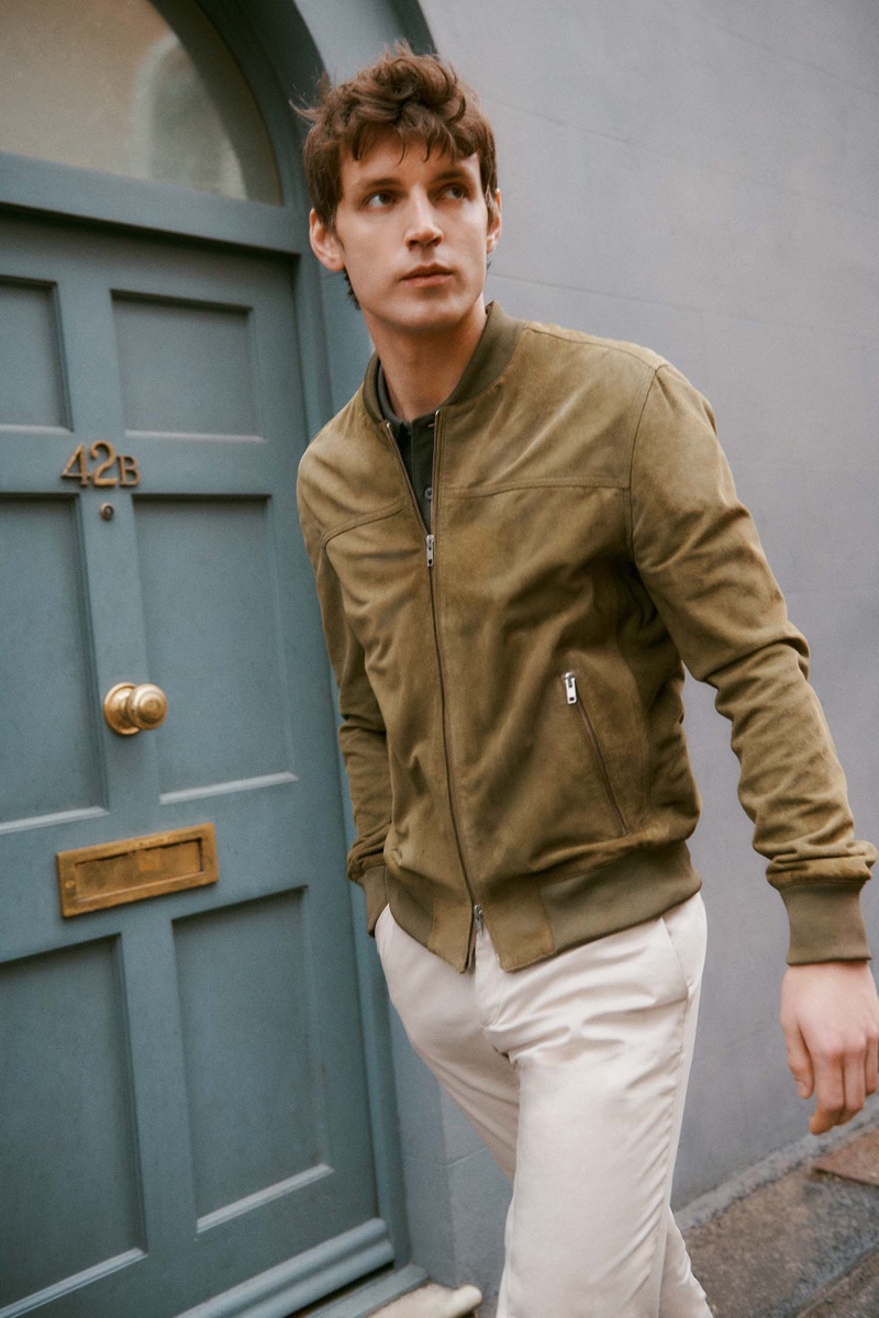 Callum Ward dons a must-have suede jacket from Paoloni's spring-summer 2022 collection.