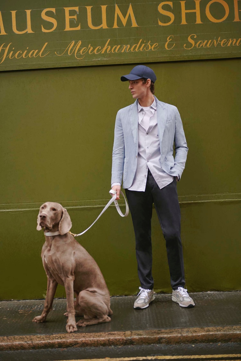 Mixing casual pieces with tailoring, Callum Ward wears a look from Paoloni's spring-summer 2022 collection.