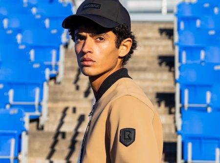 Ready for a game of football, Yahia Battawy wears RUDSAK's Julien neoprene bomber jacket.