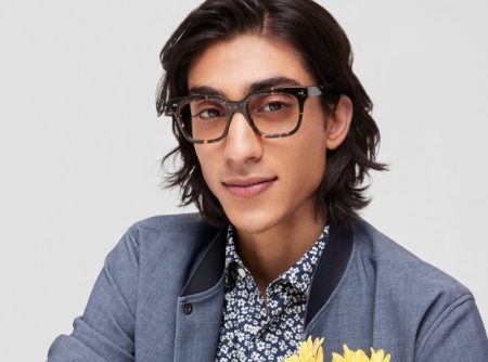 Adarsh Jaikarran charms in a pair of Warby Parker's Winston glasses in Black Oak Tortoise.