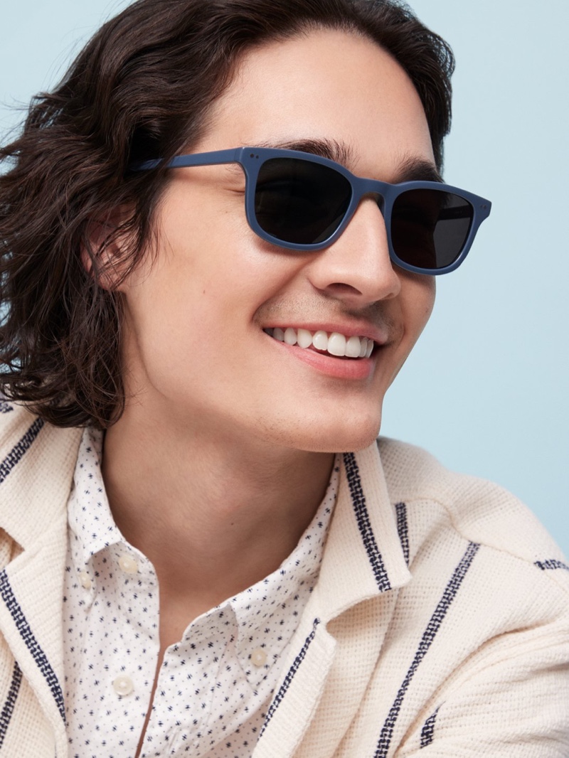 All smiles, Sebastiao Hungerbuehler wears Warby Parker's Samir sunglasses in Big Sur Blue.