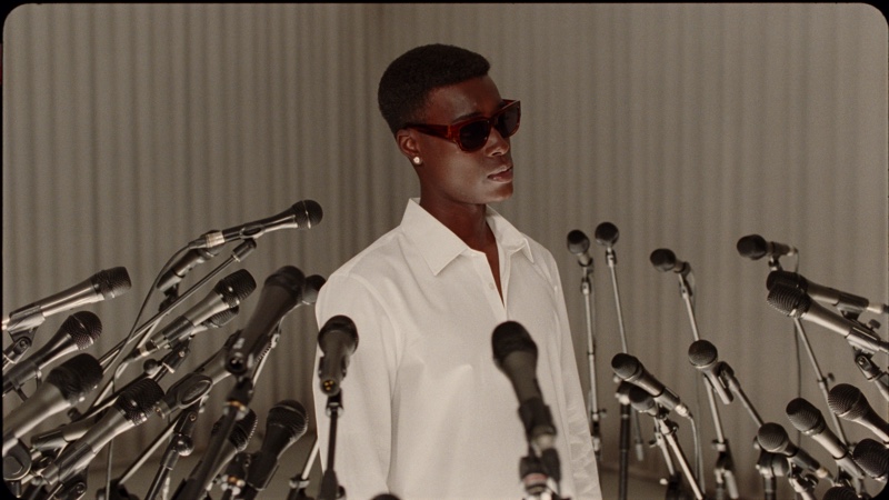Babacar N'doye holds court in a white spring-summer 2022 look from Zara's new Origins collection.