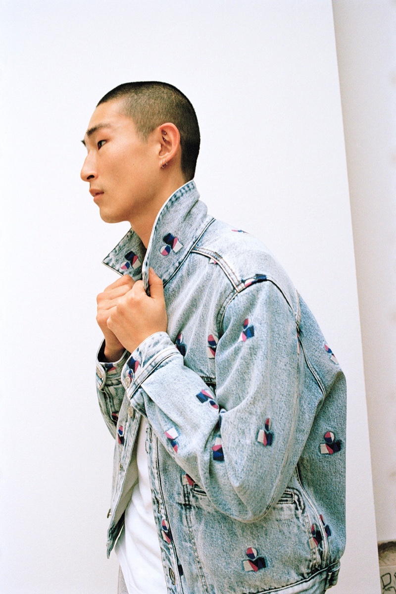 Model Sang Woo Kim wears a denim jacket by Isabel Marant.
