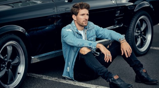 Reasons to Opt for Wider Shoes Male Model Sitting Denim Jacket Ripped Jeans Black Boots