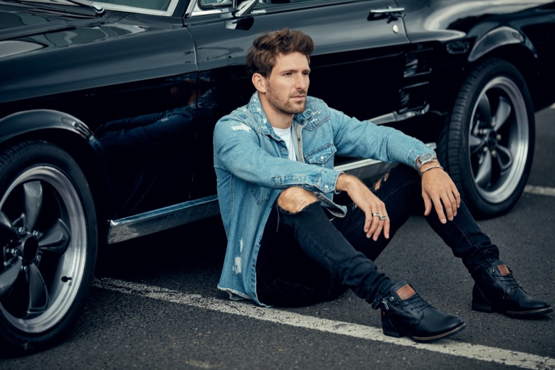 Male Model Sitting Denim Jacket Ripped Jeans Black Boots