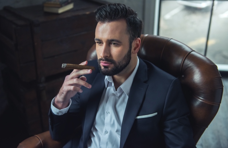 Man in Suit Smoking Cigar