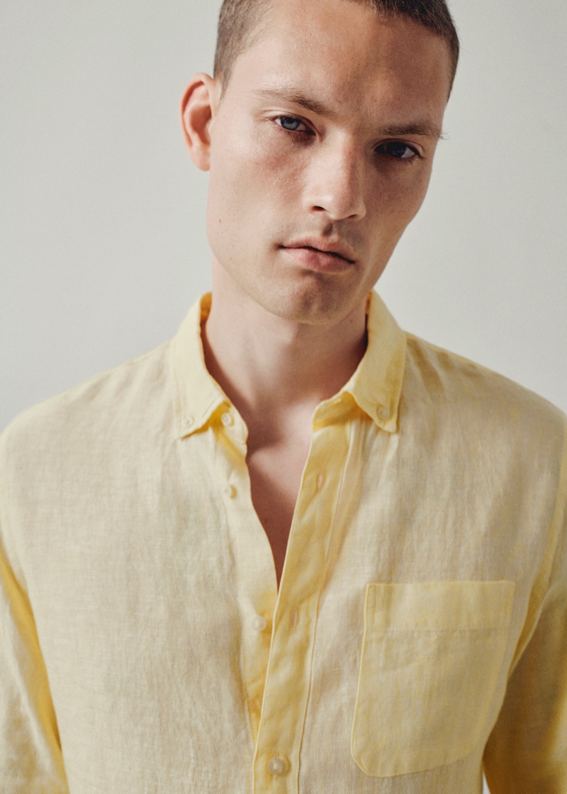 Dutch model William Los sports a yellow linen shirt from Mango Man.
