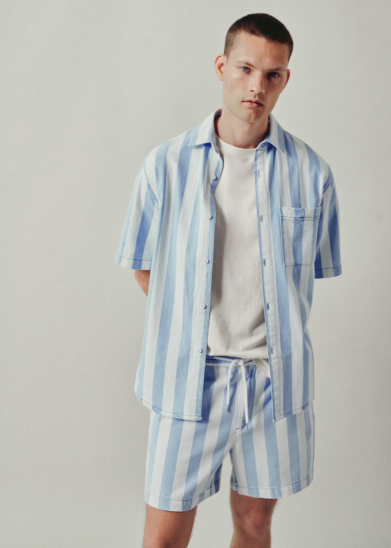 Doubling down on wide stripes, William Los wears a summery look from Mango Man.