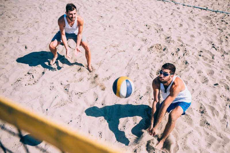 Men Playing Beach Volleyball